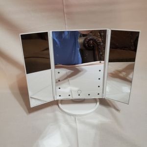 Makeup mirror with lights